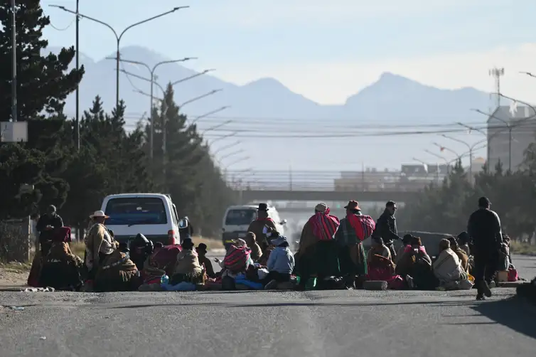 People block one of the entrances to the city of La Paz while demanding the resignation of President Rodrigo Paz amid an ongoing economic and fuel crisis, in El Alto, Bolivia, May 11, 2026. REUTERS/Claudia Morales